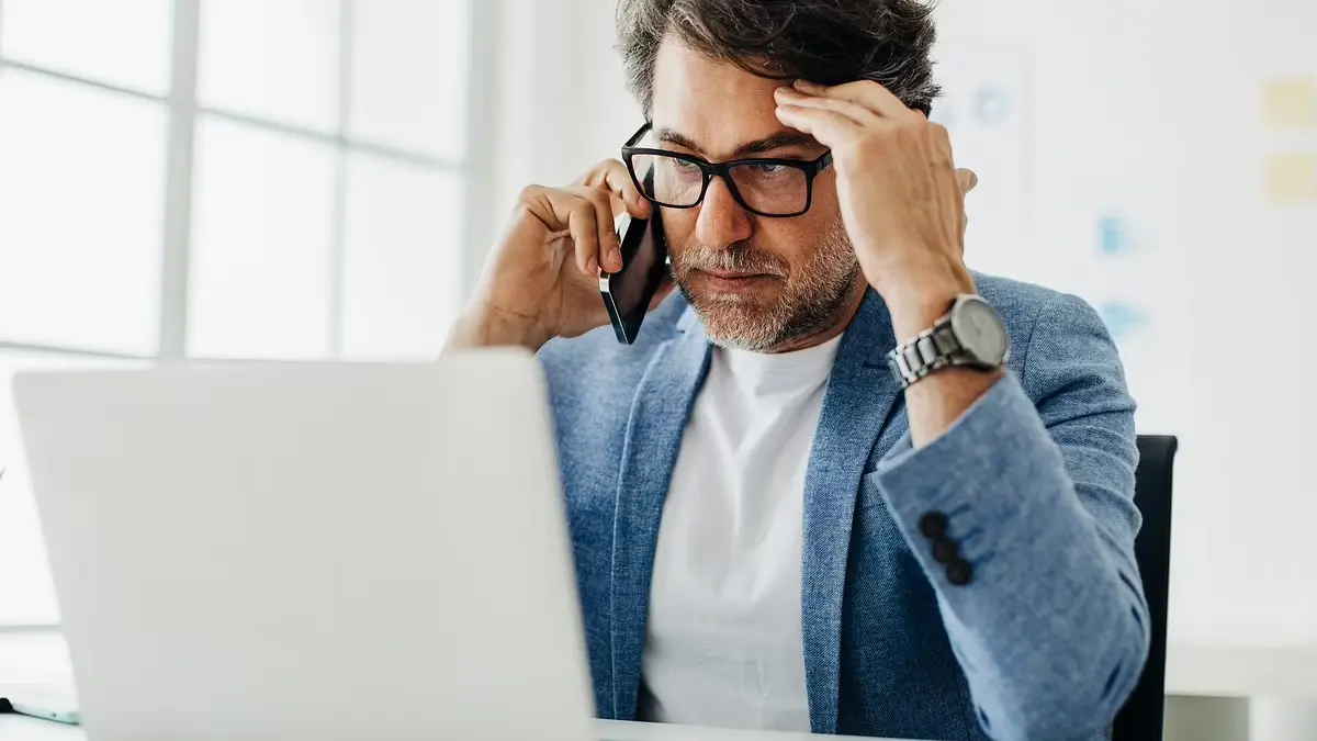 Stressed director on phone